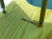 Strap on table leg