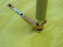 Strap on table leg