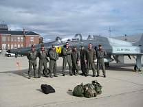 13_30flyovercrewwithplane.jpg